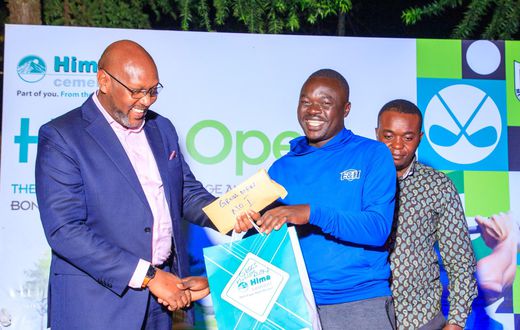 Joseph Chwinyai receives the overall winner’s recognition at the Hima Open 2025 after finishing with a gross score of 9 under par.