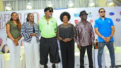 Kofi Olomide with Afrigo Band members at the press conference