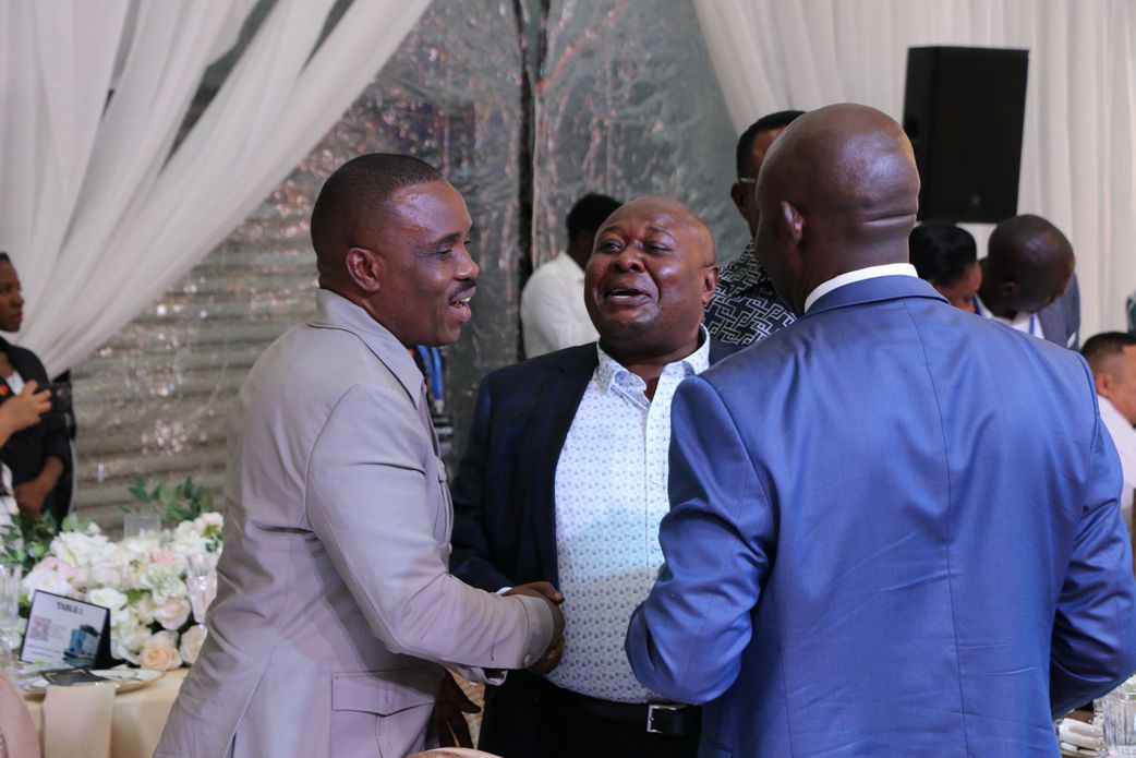 Kampala Lord Mayor Erias Lukwago chats with some of the guests