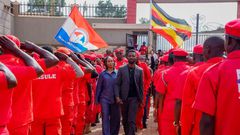 Bobi Wine touring a guard of honor