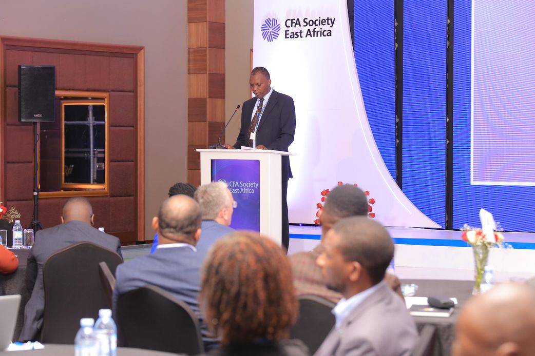 Moses Kagwa - Director Economic Affairs - Ministry of Finance sharing the PSST's address in absentia