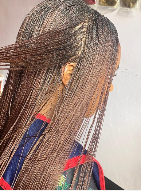 Intricate small twists by one of Bongo’s Congolese braiders