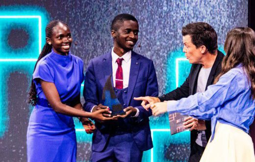 Namboozo and Muyita receiving their prize