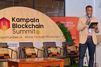 Reginald Tumusiime speaking at the Summit