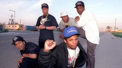 N.W.A, hip-hop’s street reporters, on March 23, 1989: Ice Cube, far left; Eazy-E, center; standing from left, DJ Yella, Dr. Dre and MC Ren. (Douglas R. Burrows / Los Angeles Times )