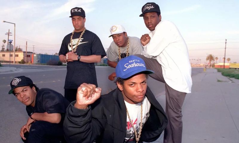 N.W.A, hip-hop’s street reporters, on March 23, 1989: Ice Cube, far left; Eazy-E, center; standing from left, DJ Yella, Dr. Dre and MC Ren. (Douglas R. Burrows / Los Angeles Times )