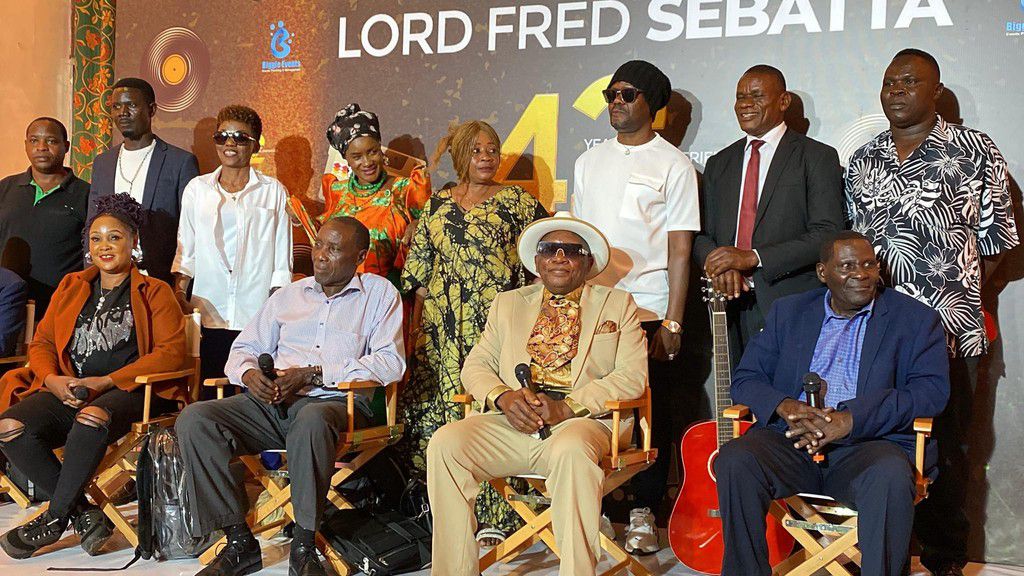Lord Fred Ssebatta and Matendo Band addressing the press conference