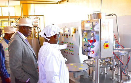 Minister Rwamirama is shown some of the plant components