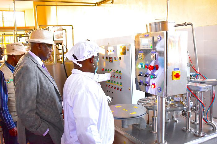 Minister Rwamirama is shown some of the plant components