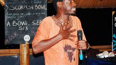 Jason Ntaro performing at Stand-up and Slam in Arena Bar and Grill, Kisimenti, Kampala, 2019