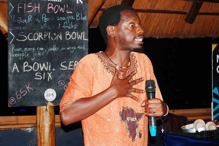 Jason Ntaro performing at Stand-up and Slam in Arena Bar and Grill, Kisimenti, Kampala, 2019