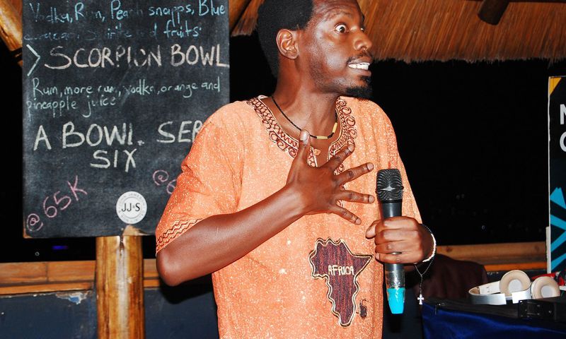 Jason Ntaro performing at Stand-up and Slam in Arena Bar and Grill, Kisimenti, Kampala, 2019