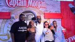 Kranium poses with fans upon arrival in Kampala