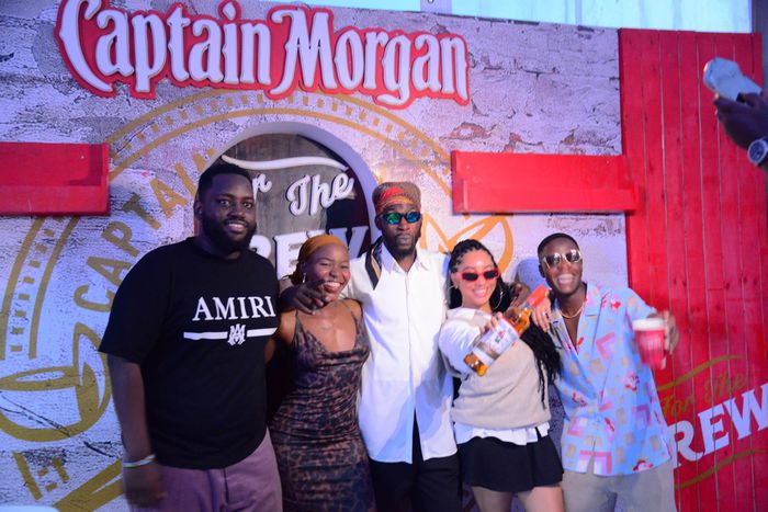 Kranium poses with fans upon arrival in Kampala