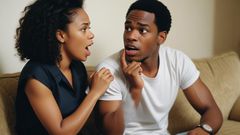 An AI-generated photo of a black couple arguing. They're sitting on a couch