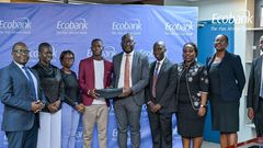 Ecobank Uganda’s Managing Director, Grace Muliisa poses with one of the winning enterprises