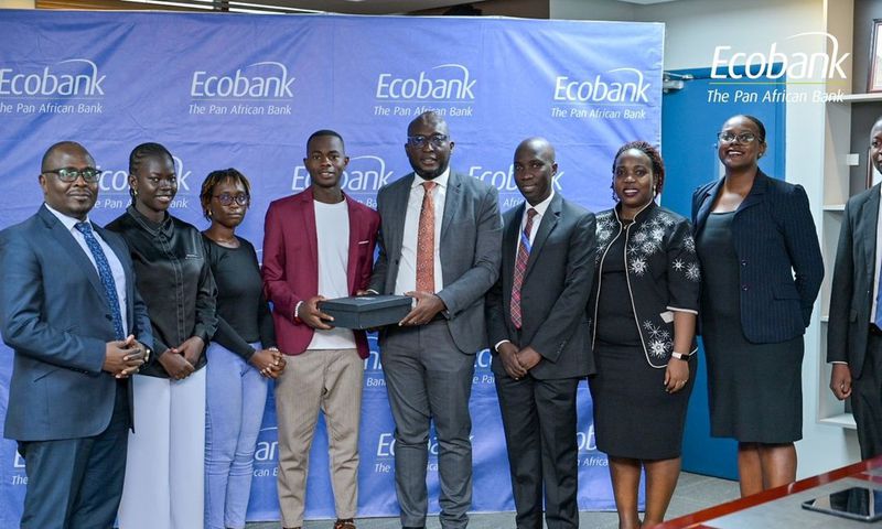 Ecobank Uganda’s Managing Director, Grace Muliisa poses with one of the winning enterprises