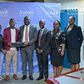 Ecobank Uganda’s Managing Director, Grace Muliisa poses with one of the winning enterprises