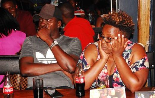 Some of the audience at Stand-up and Slam poetry/comedy event in Arena Bar and restaurant, Kisimenti, Kampala, 2019.