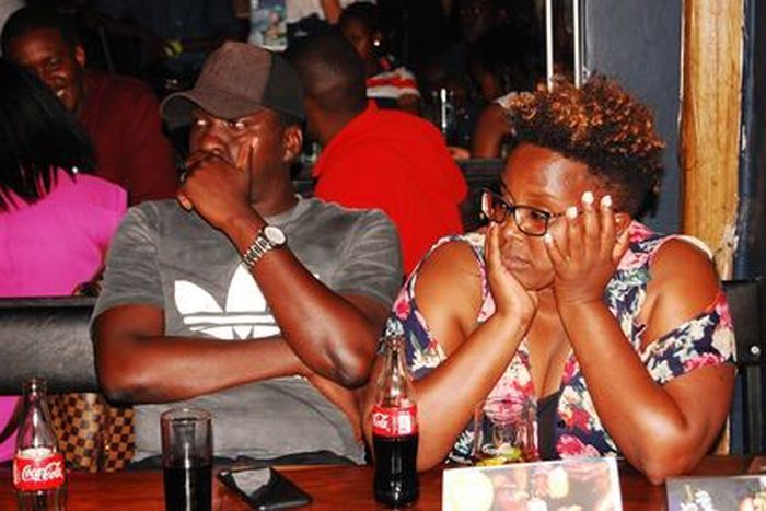 Some of the audience at Stand-up and Slam poetry/comedy event in Arena Bar and restaurant, Kisimenti, Kampala, 2019.