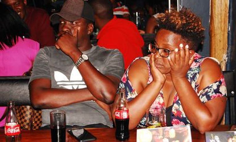 Some of the audience at Stand-up and Slam poetry/comedy event in Arena Bar and restaurant, Kisimenti, Kampala, 2019.