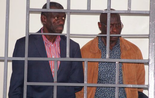 Dr Besigye and his co-accused in court