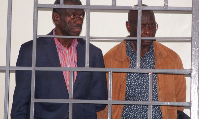 Dr Besigye and his co-accused in court