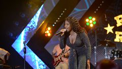 Irene Namubiru performing at the Soul on strings edition of Roast and Rhyme at Jahazi Pier