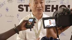 Mr. Fang Ming, HGO's Managing Director