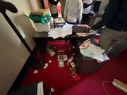 More photos from police raid on NUP properties