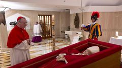 Pope Francis’ body in an open casket