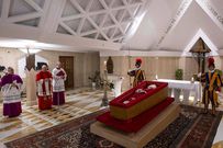 Pope Francis’ body in an open casket