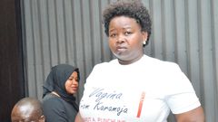 MP Faith Nakut protesting in a t-shirt