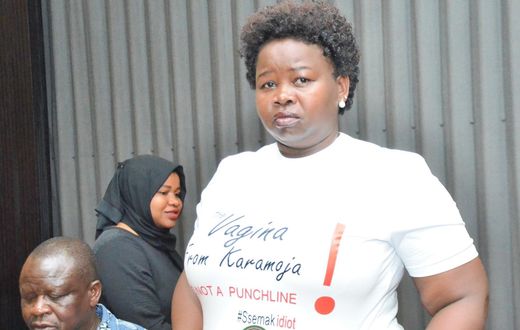 MP Faith Nakut protesting in a t-shirt