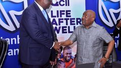 Stanbic Bank Chief Executive Mumba Kalifungwa interacts with Quality Chemicals Managing Director Mr. Katongole Emmanuel during the partnership signing event in Kampala