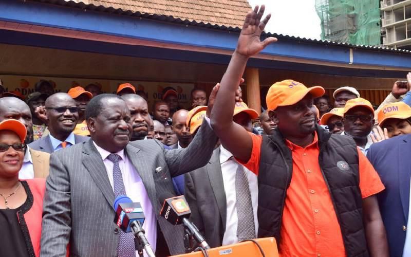 Imran Okoth with Raila Odinga