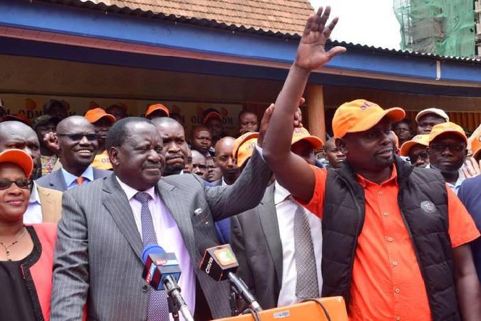 Imran Okoth with Raila Odinga