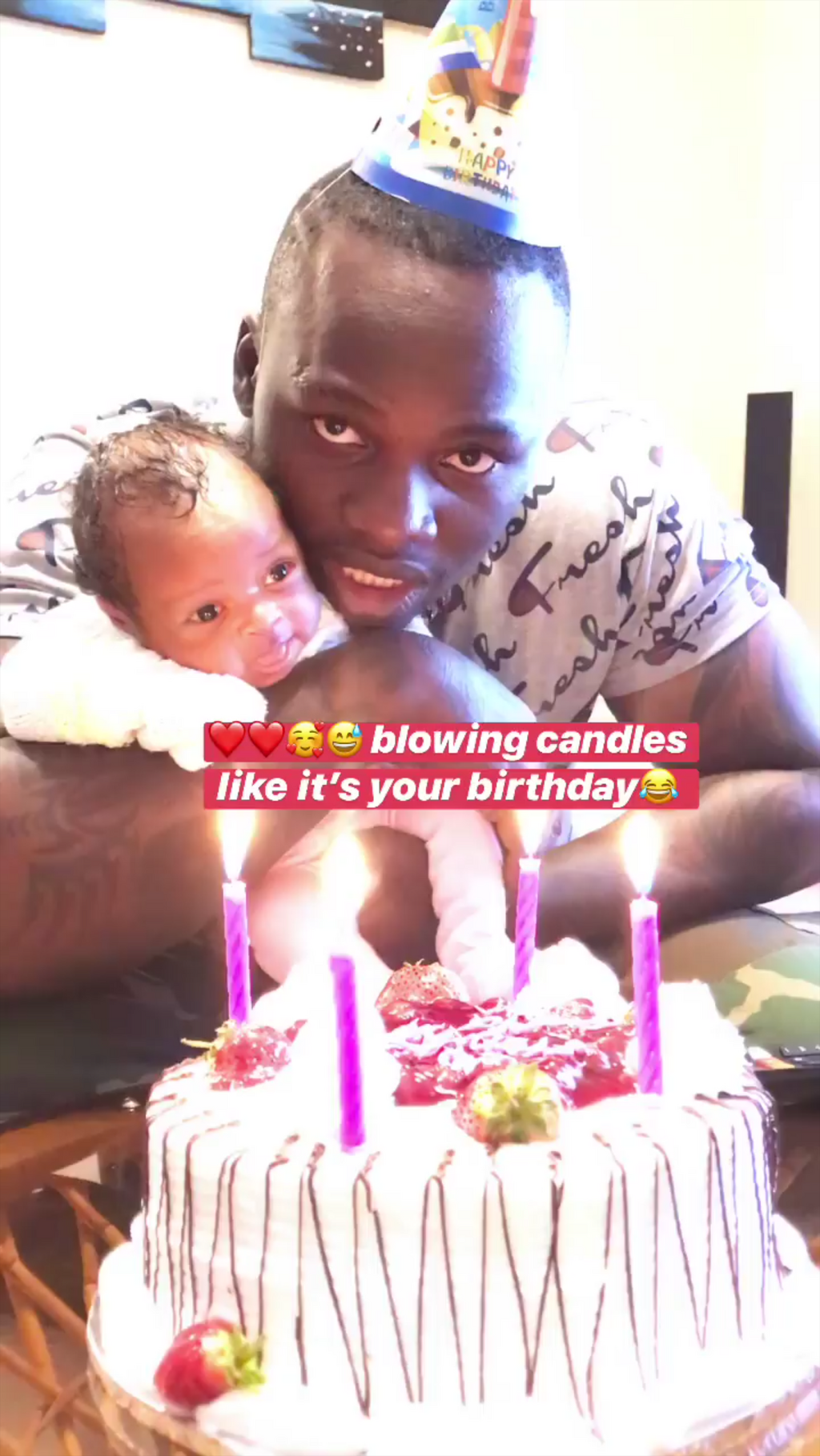 Khaligraph Jones and his daughter (Instagram)
