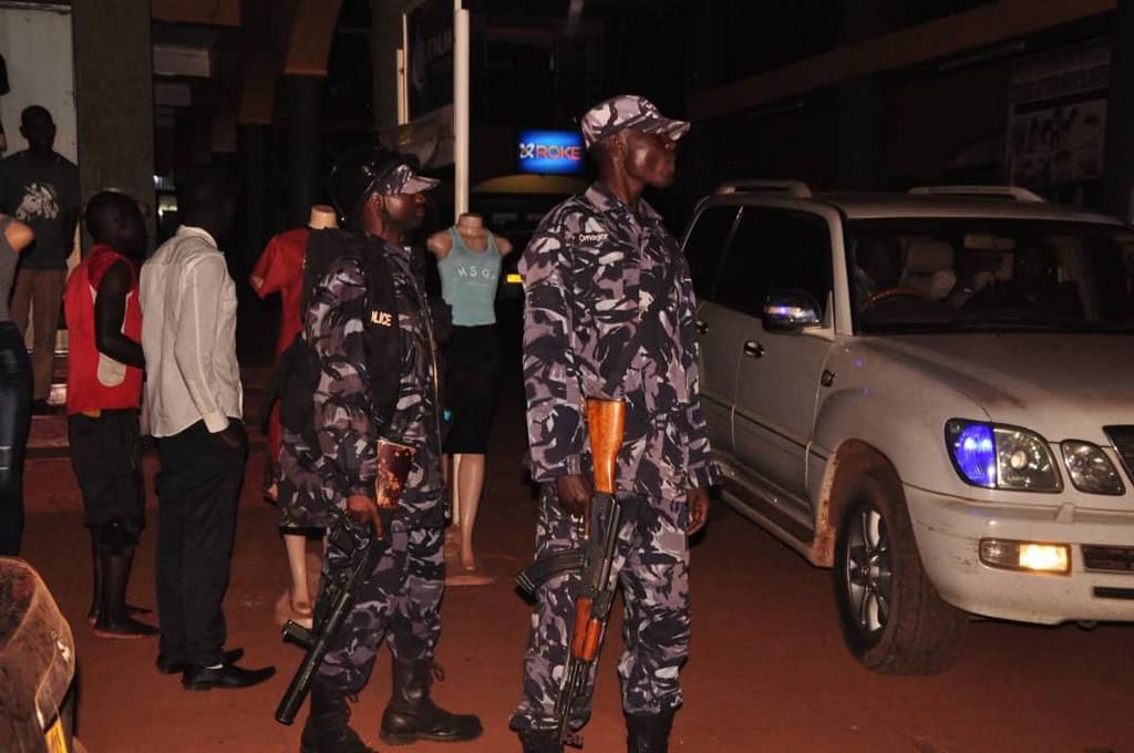 Police officer outside a hotel Bobi Wine was resting from
