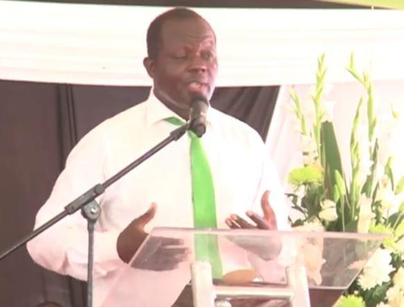 Raphael Tuju speaking in Rarieda during the burial of his brother Kefa Tuju