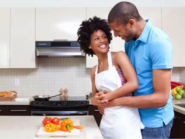 Happy couple cooking together