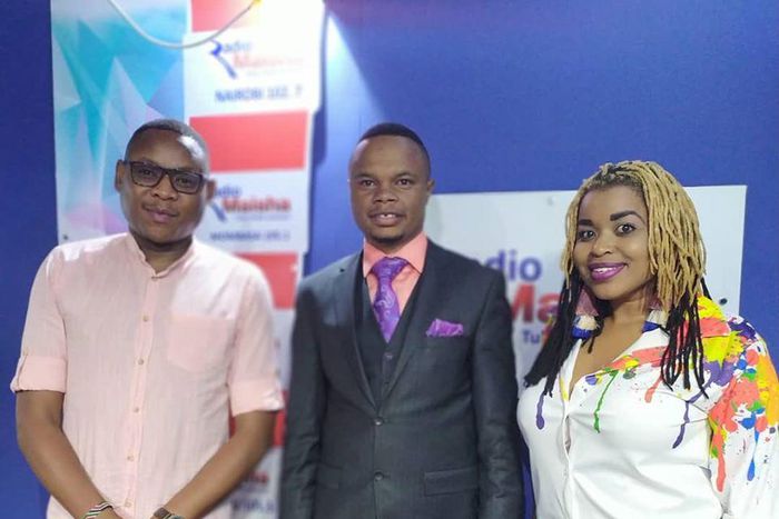File image of Peter Mureithi Wangai(middle in a suit), the Founder and CEO of Goldenscape with employees of Standard Media Group on 19 August 2019