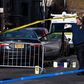 Pinned between cars, officer shoots a driver near Bronx court, police say