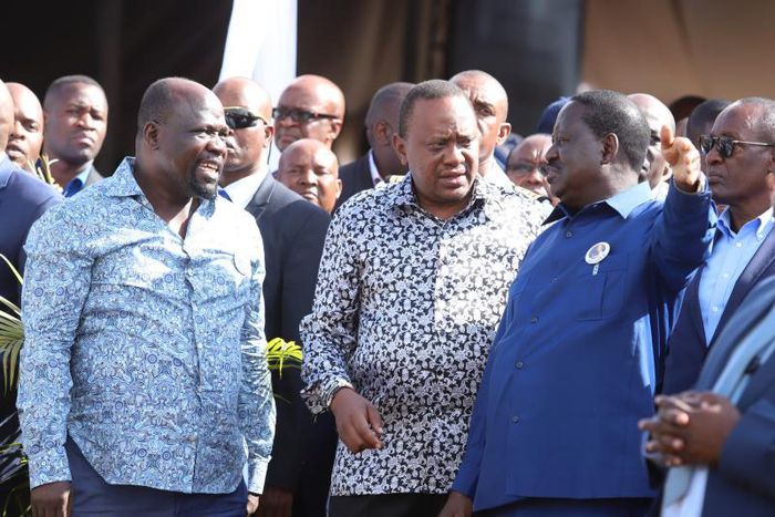 File image of President Uhuru Kenyatta (center), African Union Envoy Raila Odinga and Muhoroni MP Onyango Koyoo