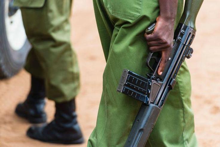 A Kenyan police officer holding a gun (Courtesy)