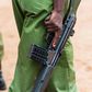 A Kenyan police officer holding a gun (Courtesy)