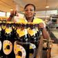 A file photo of an employee inspecting beer at an East African Breweries Ltd factory.