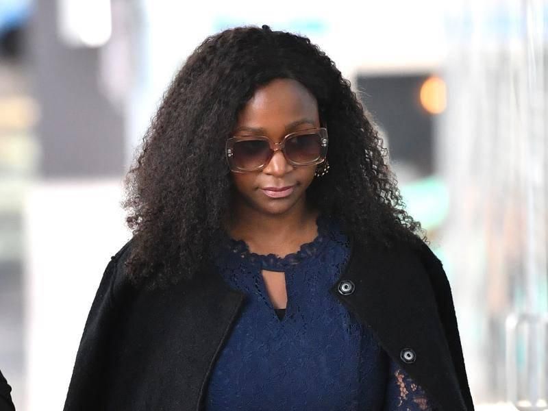 Esther Arunga leaving Court in Australia