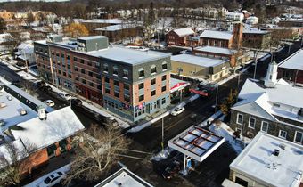 New York City Transplants and a River Town's Natives Fight for Its Soul