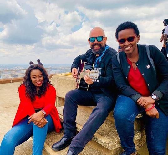 Betty Kyalo with Gilad Millo and a fan at KICC roof top